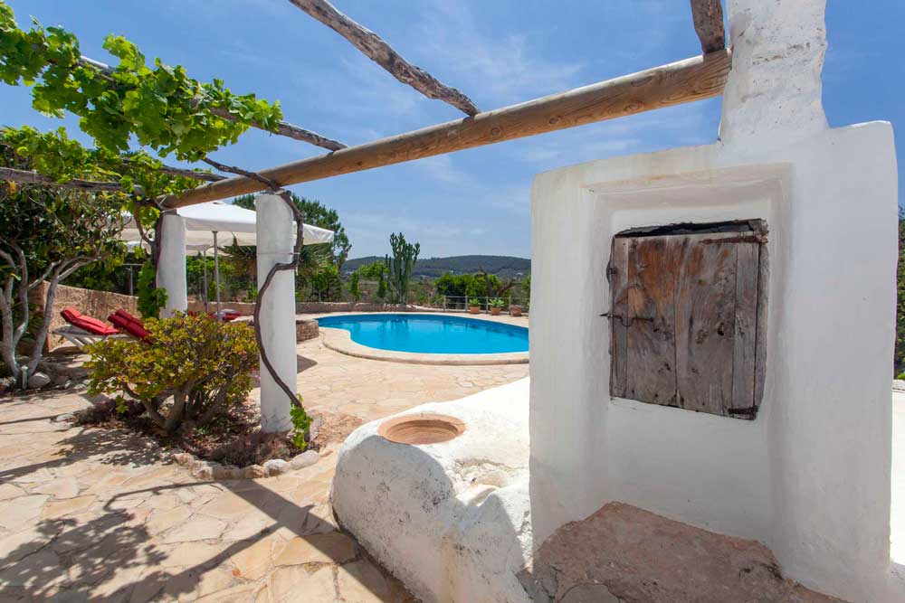 general view of the pool zone from a rental house in ibiza